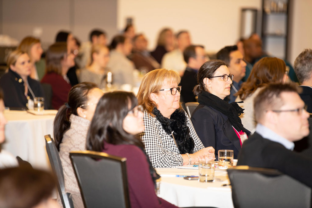 Focused attendees at a conference