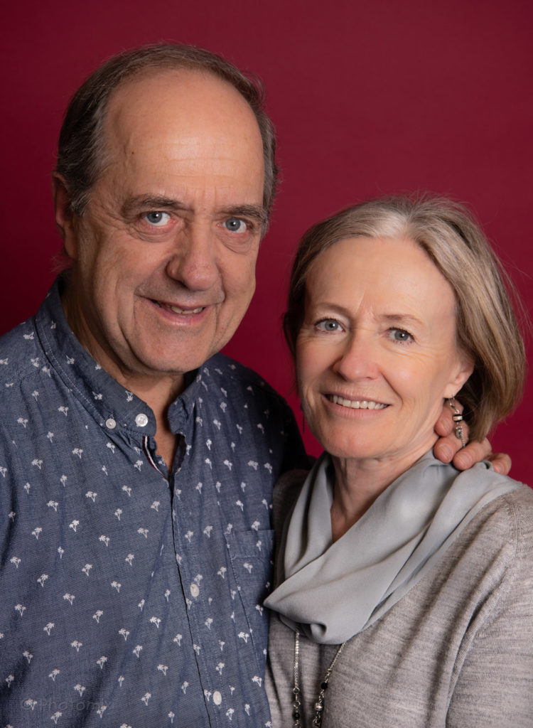 Studio portrait of older couple